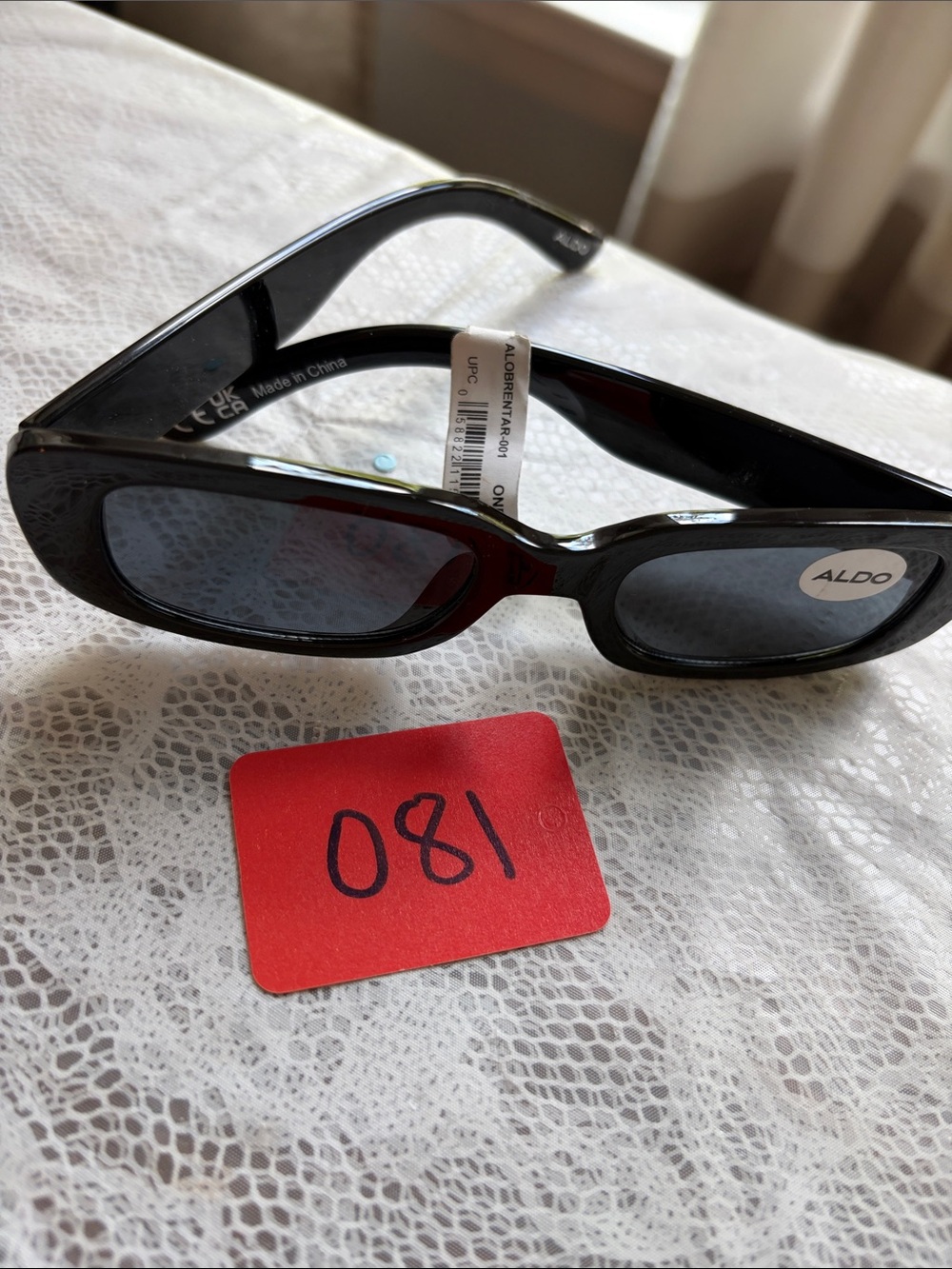 081, NWT Aldo Black Slim Oval Sunglasses.